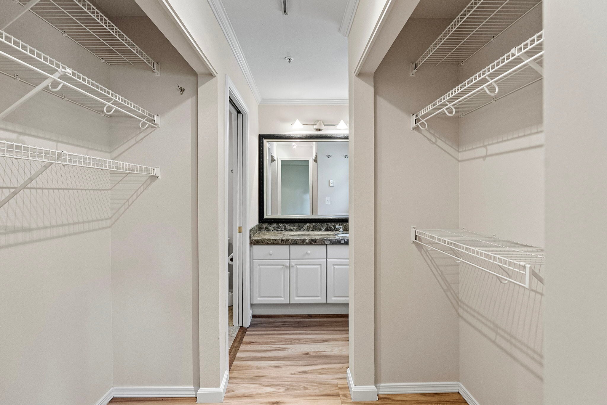Spacious primary suite closet is a passthrough to bathroom - 1220 Weaver Rd NW
