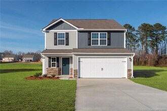 Building Photo - Beautiful 3 Bedroom with 2.5 Baths and 2-Car Garage.