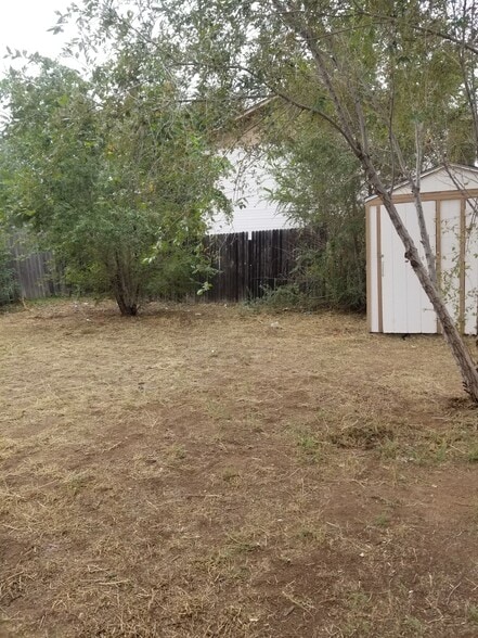 Storage space and fenced back yard - 6764 Locust St