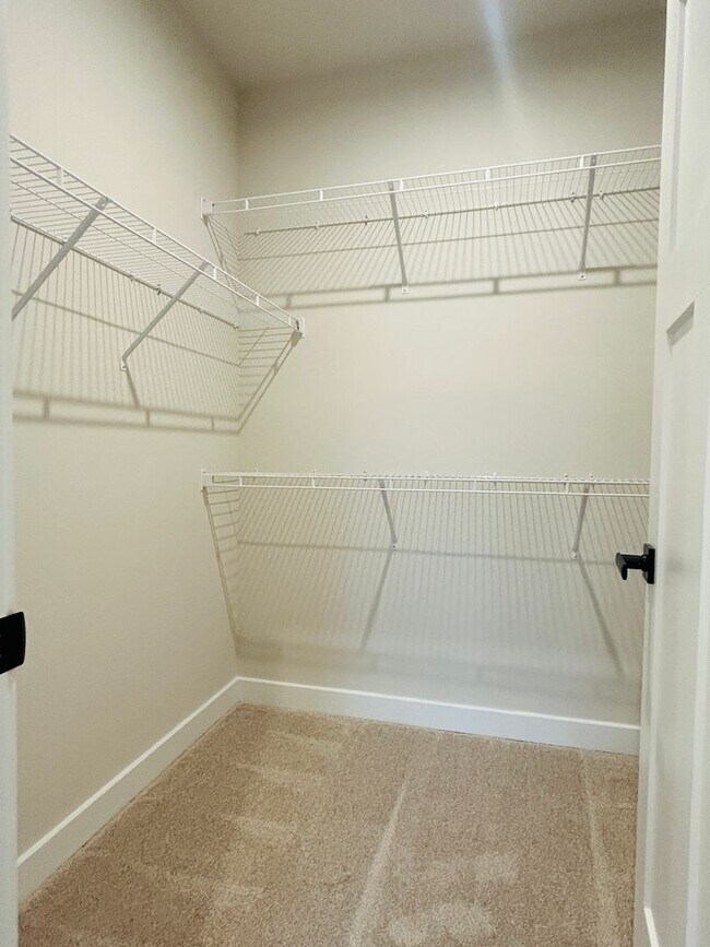 Building Photo - New Construction • 4 BR • 2 Full / 2 Half BA • End Unit Townhome in Village Town – Fayetteville’s...