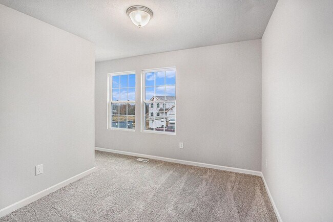 Building Photo - Newly Constructed Four Bedroom Home in Por...