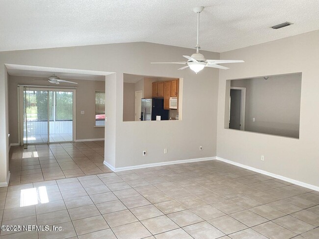 Building Photo - 5646 Chirping Way W