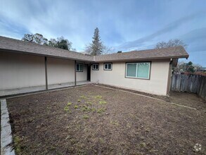 Building Photo - Gorgeous updated home with large side yard!