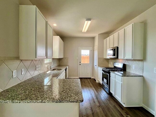 Building Photo - 4814 Blue Jacaranda Wy