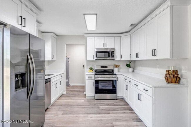 Building Photo - Waterfront 3 BR 2 BA Remodeled Rental Home