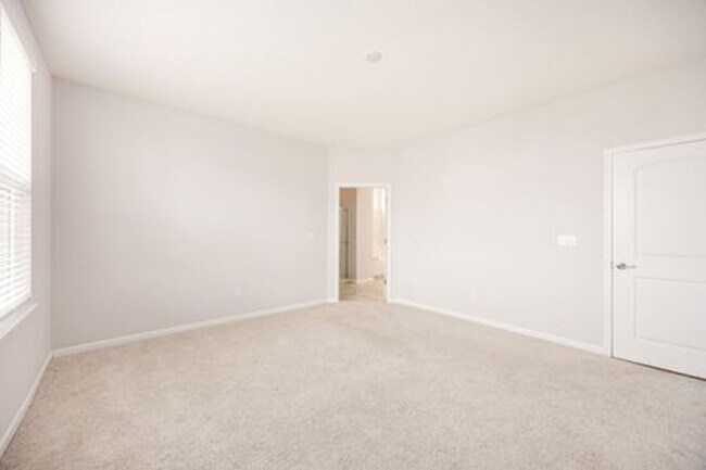 Building Photo - Updated 3-Bedroom Home with 3 Baths, Open-Concept Layout, Luxury Flooring & Bright Modern Kitchen