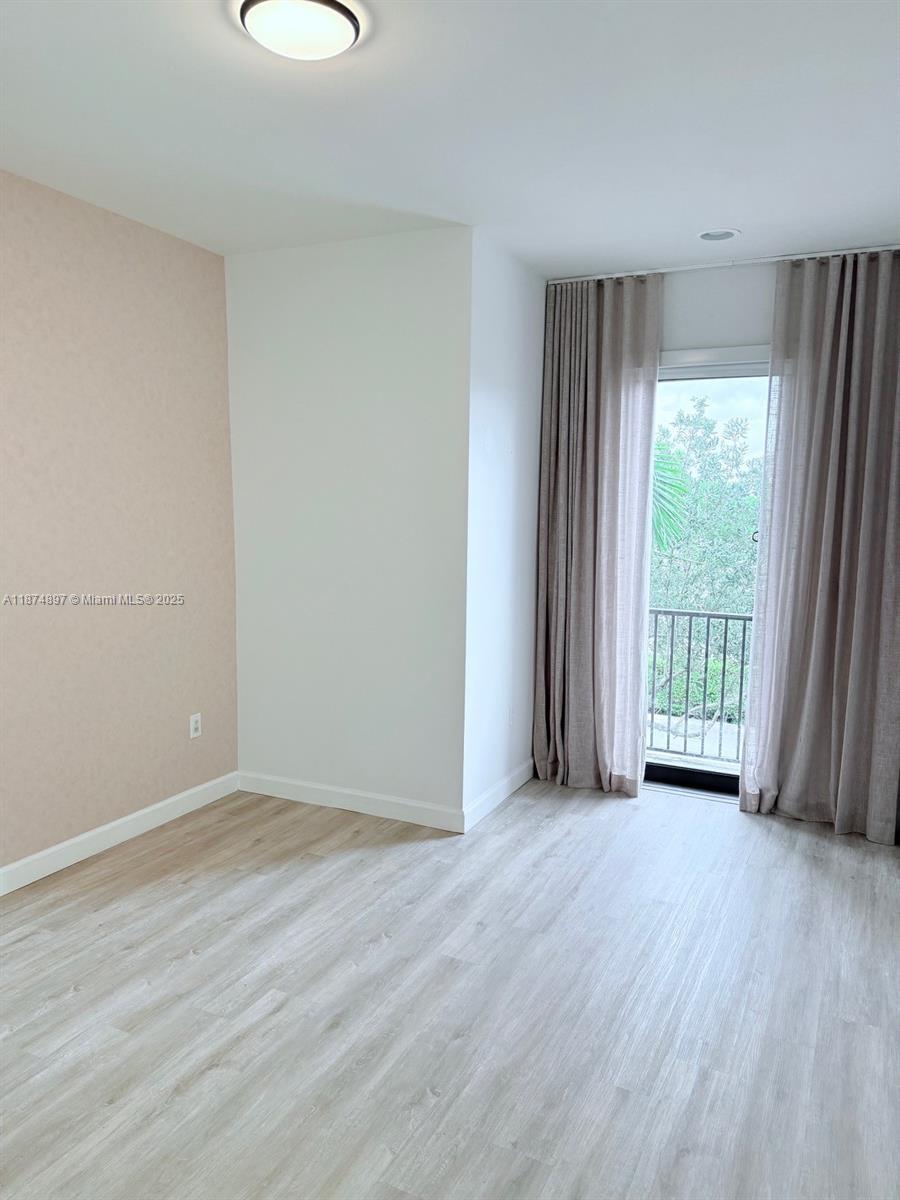 Building Photo - 5980 NW 104th Ct