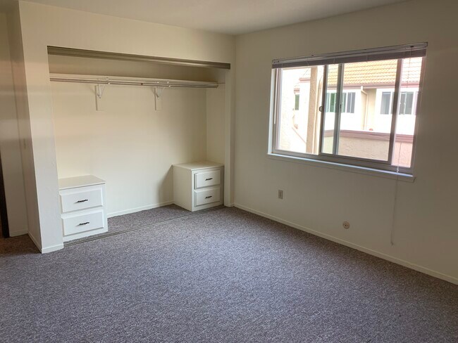 bedroom with built-in drawers - 258 California Blvd