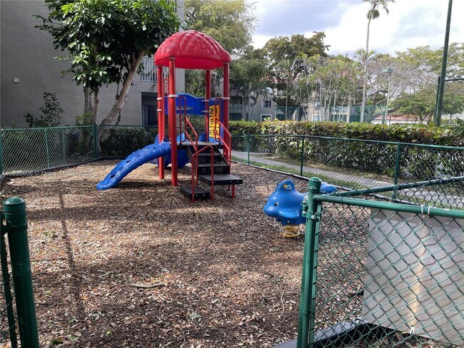 Building Photo - 1865 Palm Cove Blvd