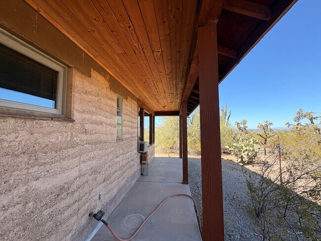 Building Photo - Desert Home on 3.3 Acres with Rooftop Views & Unique Rammed Earth Design