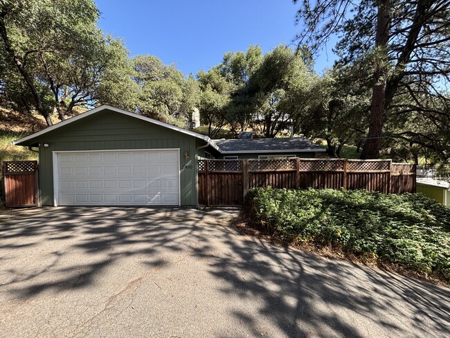 Primary Photo - Darling 2-bed home with private lot nestle...