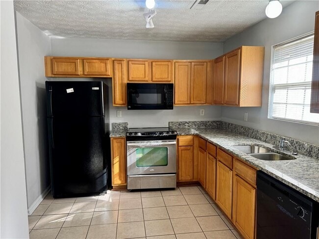 Building Photo - 5663 Windfall Ln