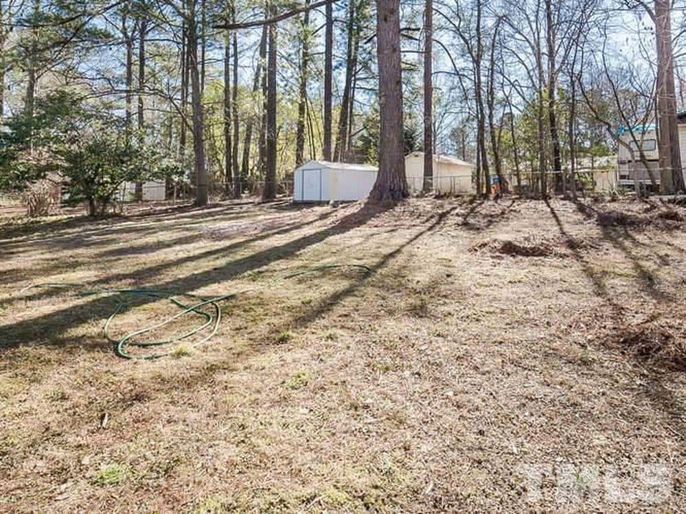 backyard with large storage shed - 515 Mayfair St