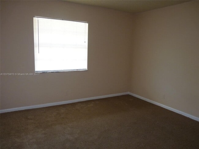 Building Photo - 3100 Coral Springs Dr