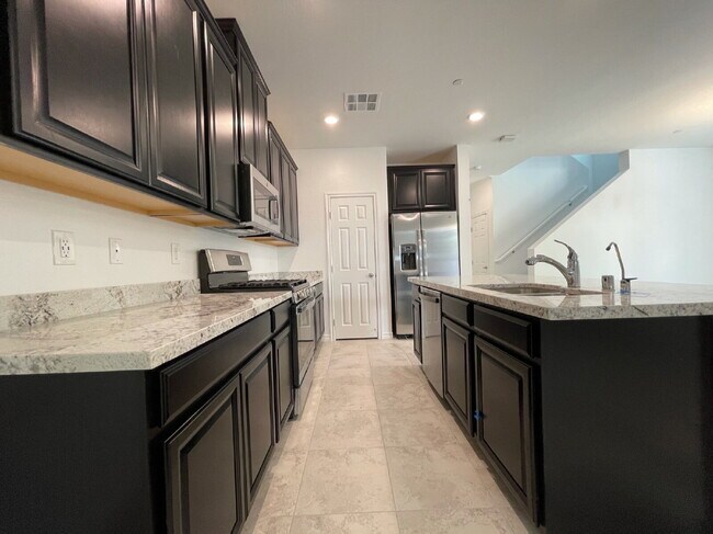 Building Photo - GATED 3 BED 2.5 BATH 2 CAR GARAGE + LOFT IN NORTH LAS VEGAS