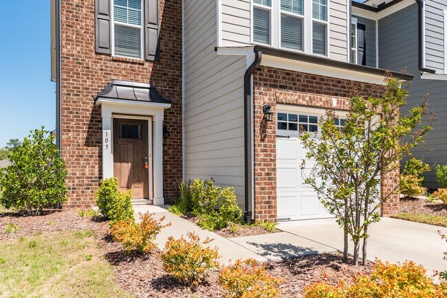 Building Photo - End unit townhome loaded with upgrades close to RTP! Available: Now