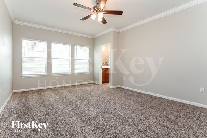 Building Photo - 8906 Devon Pines Dr