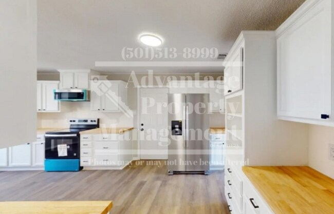Building Photo - Showings Available!