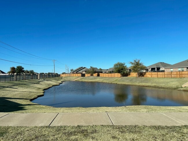 Building Photo - Neighborhood pond, playground, walking tra...