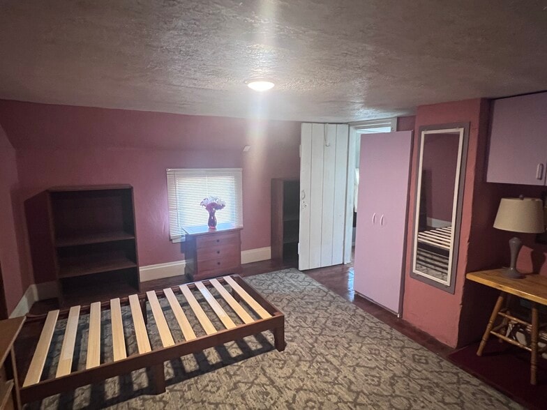 2nd floor bedroom #2 with dressers and twin bed - 668 Brooklyn Ave