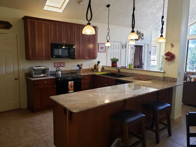 Building Photo - Gorgeous Views and a backyard oasis at thi...