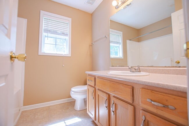 Building Photo - Pet Friendly Three Bedroom with Bonus!