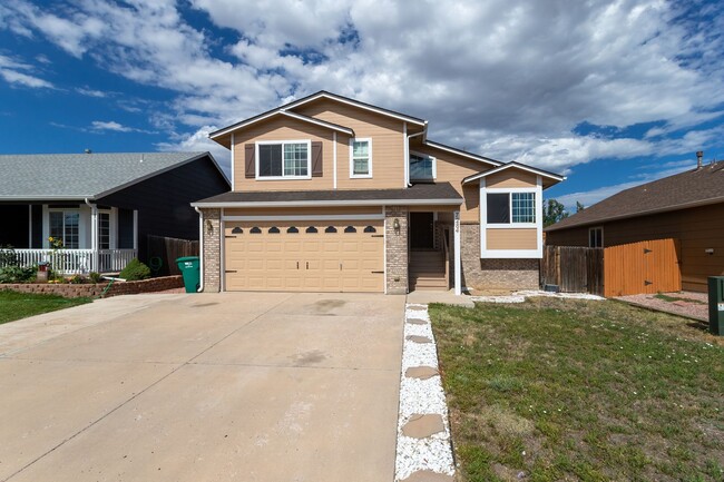 Primary Photo - Charming 4-Bedroom Home Near Fort Carson i...