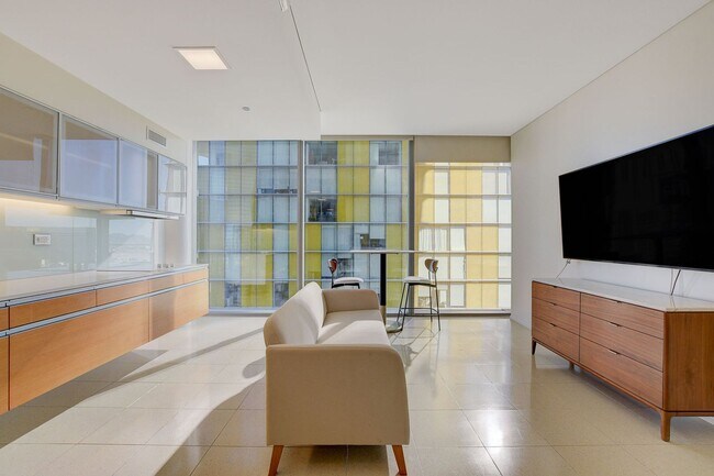 Building Photo - Stunning Strip Views from this Fully Furnished Studio Residence.