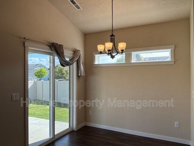 Building Photo - 9070 W Songwood Dr