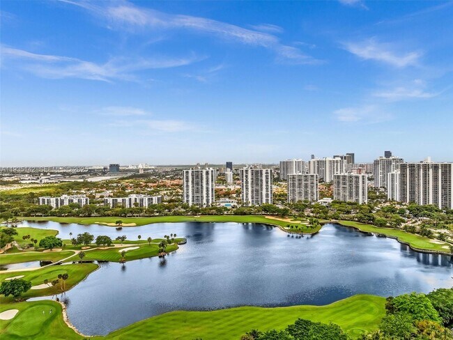 Building Photo - 3675 N Country Club Dr