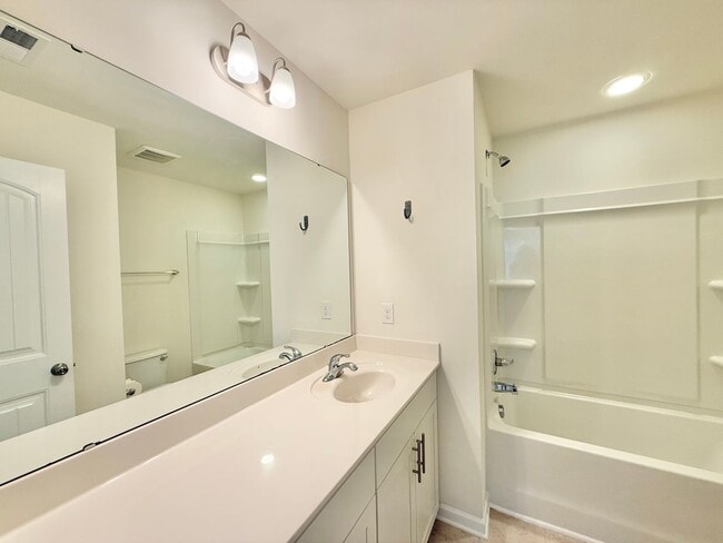 Building Photo - Stunning 3BD, 2.5BA End Unit Townhome in t...