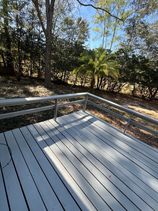 Building Photo - 3/2  home fenced in backyard located acros...