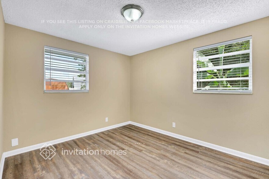 Building Photo - 6968 Delisle Dr