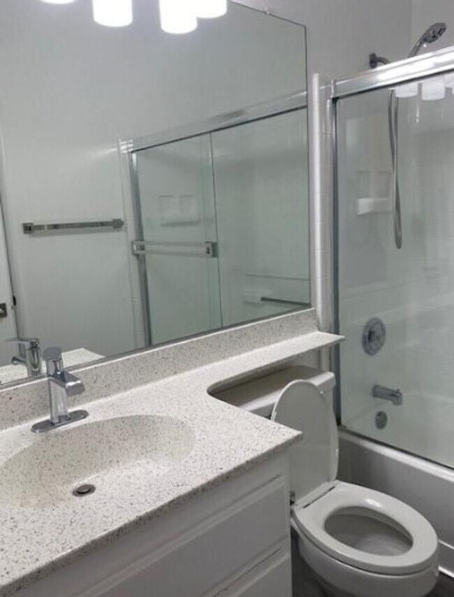 Building Photo - Step into luxury living with this exquisite 2 bedroom 2 bath 3rd floor condo at Emerald Villas