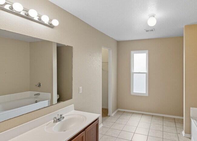 Building Photo - Incredible value with a **washer, dryer, refrigerator, shed, and a covered backyard with a dog run!