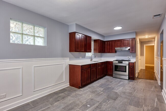 Building Photo - 7835 S Essex Ave