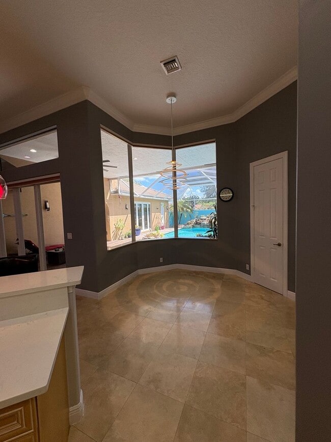 Building Photo - Spacious 3/3.5 3 car garage home in Palm City