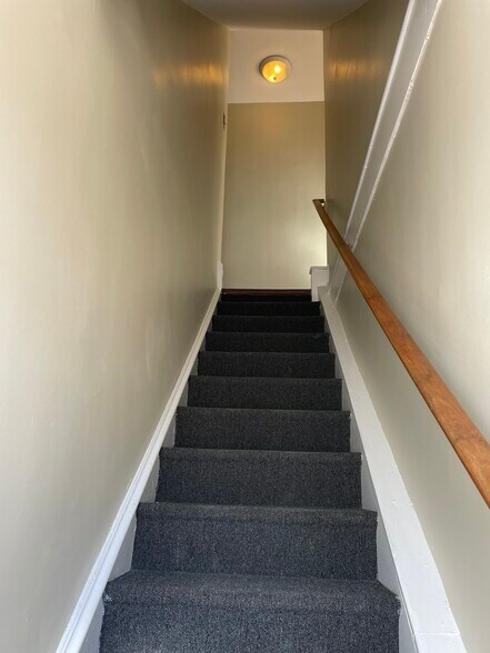 Stair up to 2nd floor unit from private side entrance. - 600 Roxborough Ave