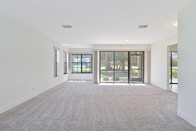 Building Photo - NOW AVAILABLE - First Floor Condo with 1 Car Garage in Eagle Ridge!