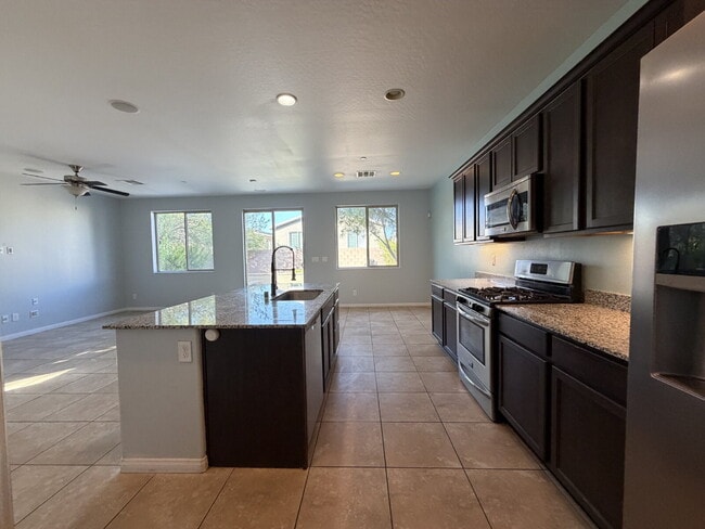 Building Photo - 4 BED 2.5 BATH 2 CAR GARAGE SINGLE FAMILY HOME W/ FULLY LANDSCAPED BACKYARD. THIS WAS FORMER MODE...