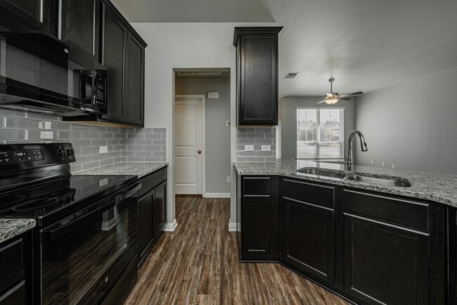 Building Photo - Live, love, and grow in this charming home!