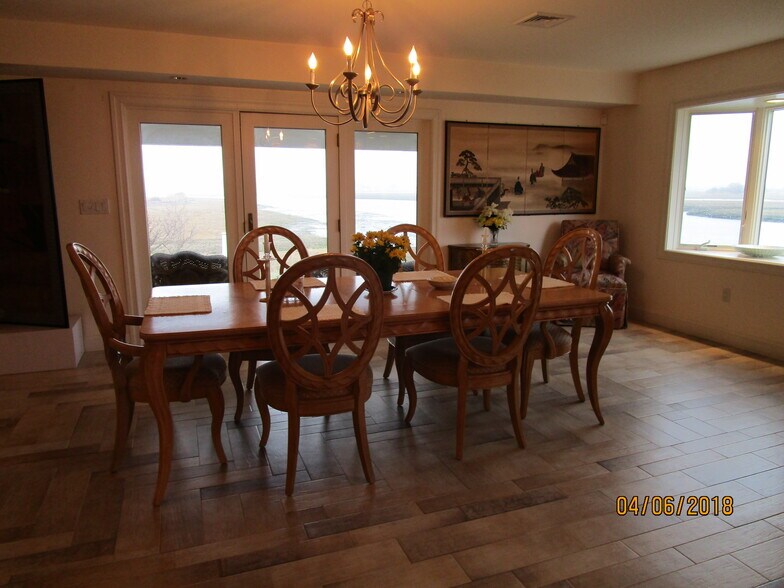 dining area with views out to marsh - 103 Summer St