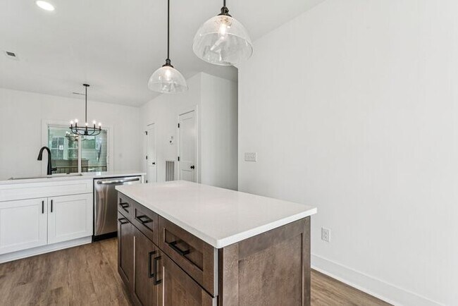 Building Photo - High-End 2BR Townhome | Rooftop Terrace + 2-Car Garage | 24-Unit Community