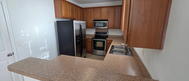 Building Photo - This phenomenal townhome is truly move-in ready!