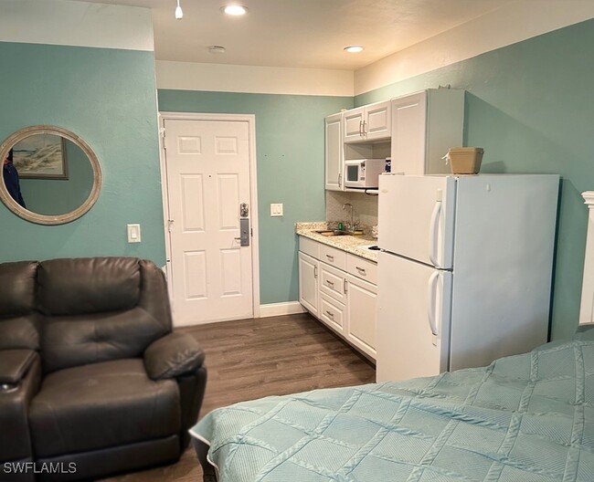 Building Photo - 25000 Tamiami Trl