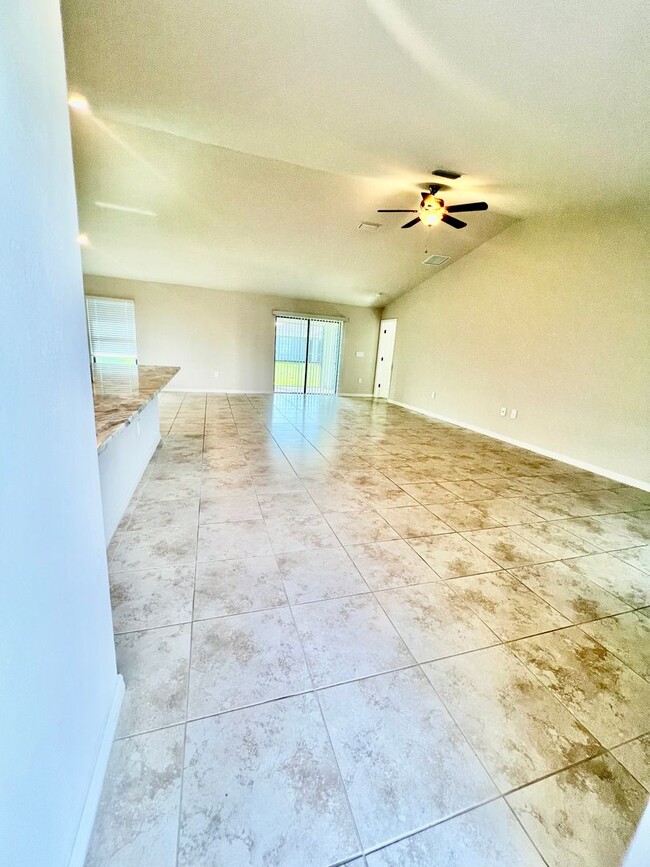 Building Photo - Cape Coral Gem: Stylish 3BR/2BA Home with ...