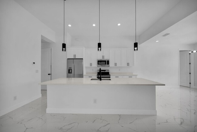 Building Photo - Brand-New Pool Home for Rent – Port Charlo...