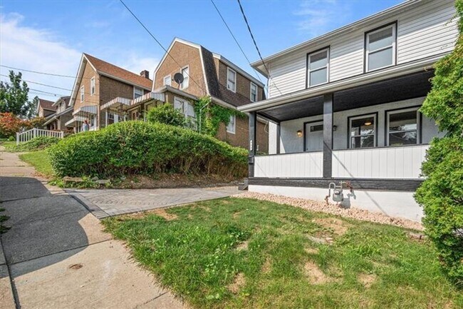 Building Photo - Spacious 4-Bedroom Home with Modern Updates & Private Driveway