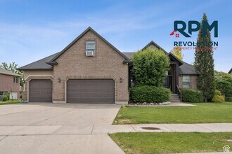 Building Photo - "Spacious 6-Bed Gem with Granite Touches & Cozy Fireplace in Morgan!"