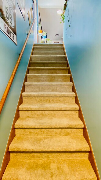 Stairwell to the upper unit. - 384 Minz Park Cir